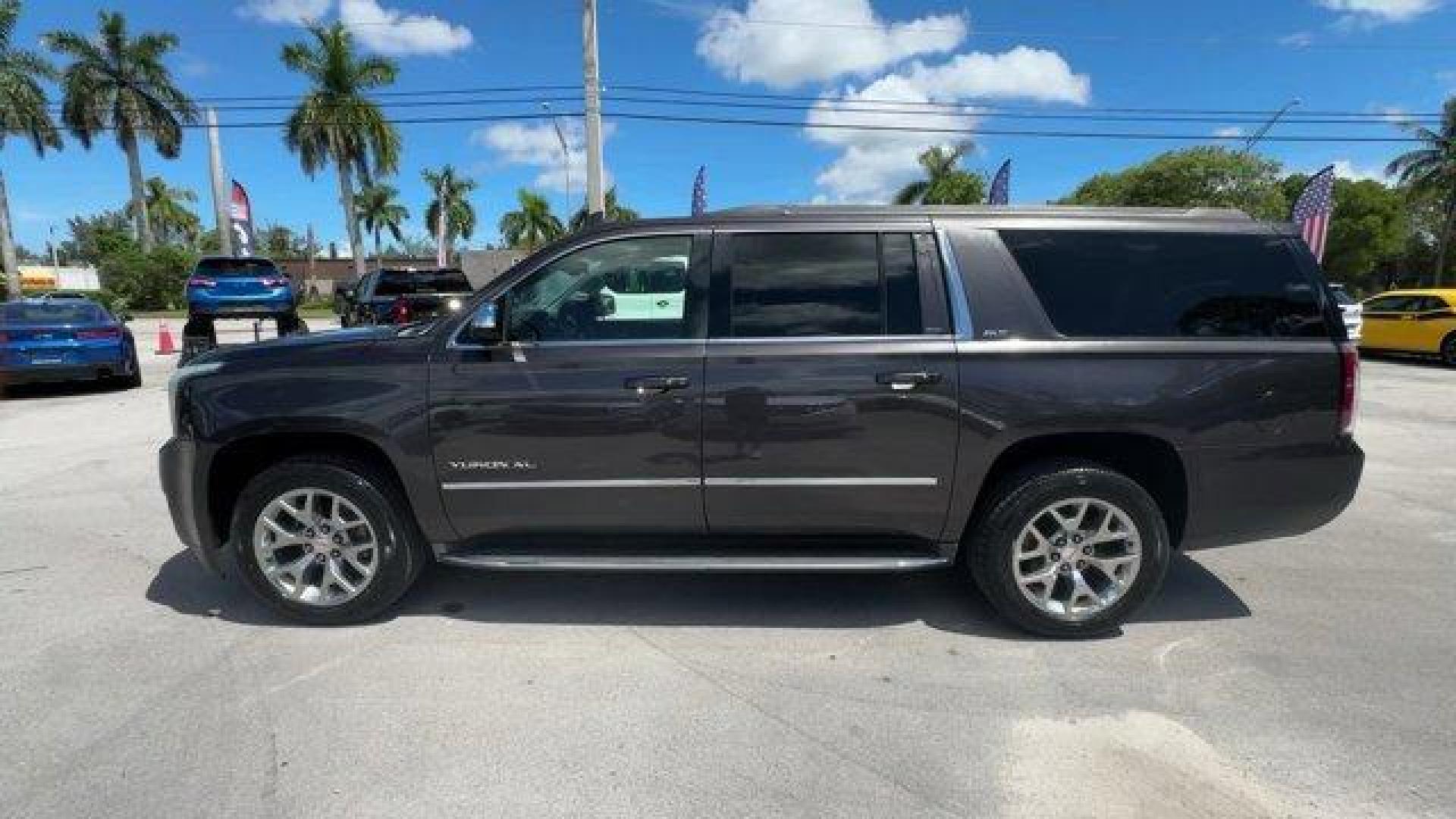 2015 Iridium Metallic /Jet Black GMC Yukon XL (1GKS1HKC9FR) with an 8 5.3L engine, Automatic transmission, located at 27610 S Dixie Hwy, Homestead, FL, 33032, (305) 749-2348, 25.510241, -80.438301 - KBB.com Brand Image Awards. Boasts 23 Highway MPG and 16 City MPG! This GMC Yukon XL delivers a Gas/Ethanol V8 5.3L/323 engine powering this Automatic transmission. WHEELS, 20 X 9 (50.8 CM X 22.9 CM) POLISHED ALUMINUM, TRANSMISSION, 6-SPEED AUTOMATIC, ELECTRONICALLY CONTROLLED with overdrive, tow/ha - Photo#1