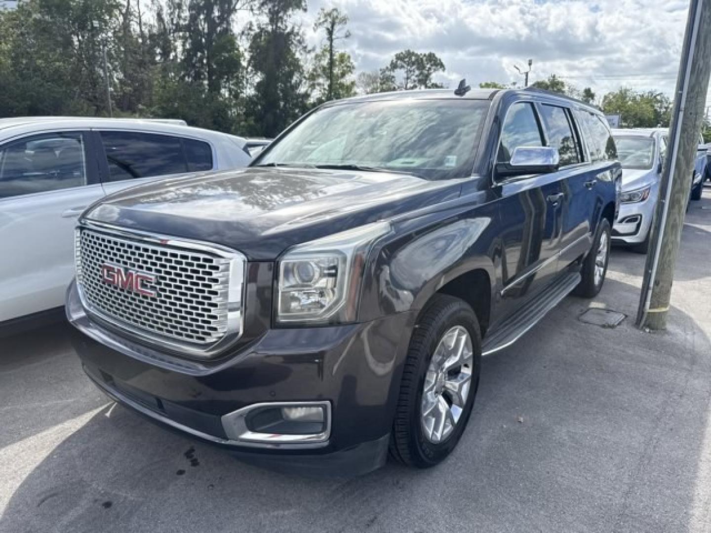 2015 Iridium Metallic /Jet Black GMC Yukon XL (1GKS1HKC9FR) with an 8 5.3L engine, Automatic transmission, located at 27610 S Dixie Hwy, Homestead, FL, 33032, (305) 749-2348, 25.510241, -80.438301 - KBB.com Brand Image Awards. Boasts 23 Highway MPG and 16 City MPG! This GMC Yukon XL delivers a Gas/Ethanol V8 5.3L/323 engine powering this Automatic transmission. WHEELS, 20 X 9 (50.8 CM X 22.9 CM) POLISHED ALUMINUM, TRANSMISSION, 6-SPEED AUTOMATIC, ELECTRONICALLY CONTROLLED with overdrive, tow/ha- Photo#0