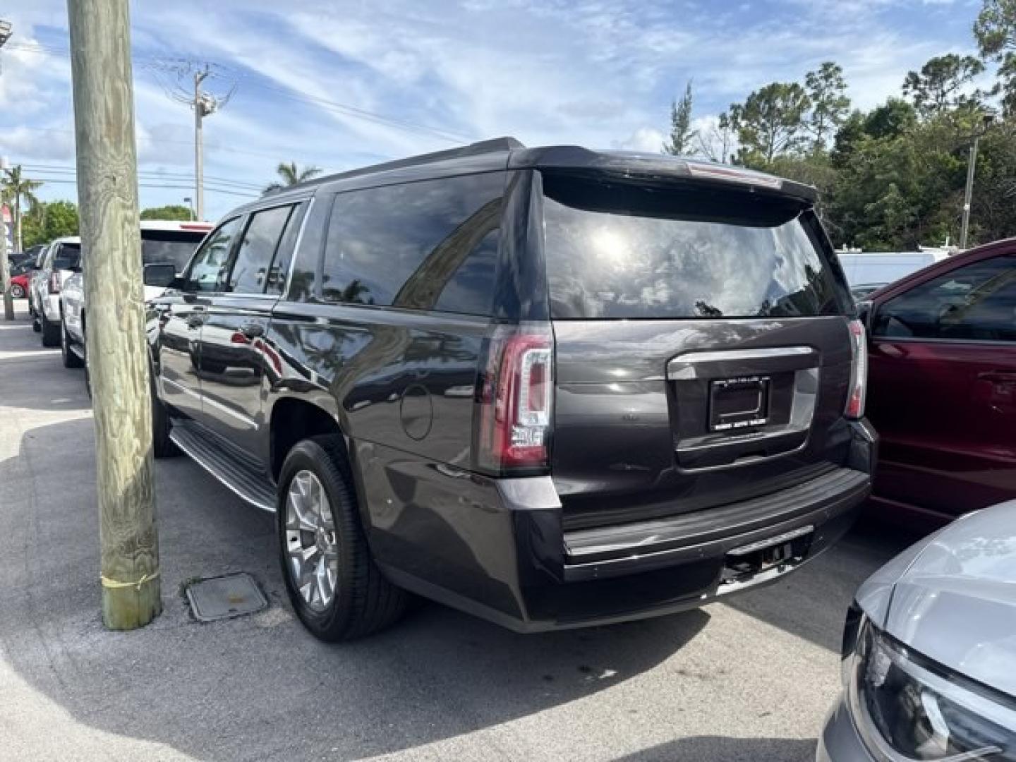 2015 Iridium Metallic /Jet Black GMC Yukon XL (1GKS1HKC9FR) with an 8 5.3L engine, Automatic transmission, located at 27610 S Dixie Hwy, Homestead, FL, 33032, (305) 749-2348, 25.510241, -80.438301 - KBB.com Brand Image Awards. Boasts 23 Highway MPG and 16 City MPG! This GMC Yukon XL delivers a Gas/Ethanol V8 5.3L/323 engine powering this Automatic transmission. WHEELS, 20 X 9 (50.8 CM X 22.9 CM) POLISHED ALUMINUM, TRANSMISSION, 6-SPEED AUTOMATIC, ELECTRONICALLY CONTROLLED with overdrive, tow/ha- Photo#1
