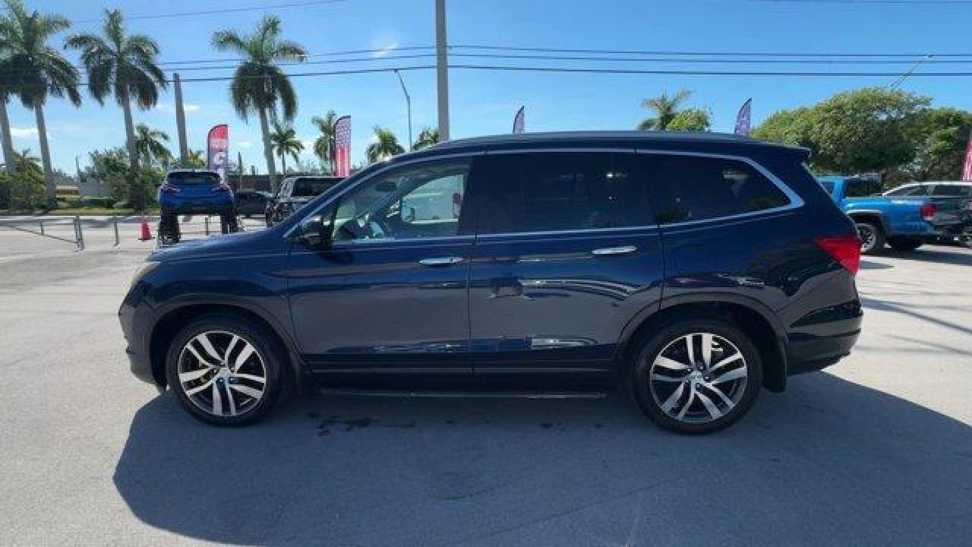 2017 Blue Honda Pilot (5FNYF5H96HB) with an 6 3.5 L engine, Automatic transmission, located at 27610 S Dixie Hwy, Homestead, FL, 33032, (305) 749-2348, 25.510241, -80.438301 - IIHS Top Safety Pick+. Boasts 27 Highway MPG and 20 City MPG! This Honda Pilot boasts a Regular Unleaded V-6 3.5 L/212 engine powering this Automatic transmission. Window Grid Antenna, Wheels: 20 Alloy, Wheels w/Machined Accents.*This Honda Pilot Comes Equipped with These Options *VSA Electronic Sta - Photo#1