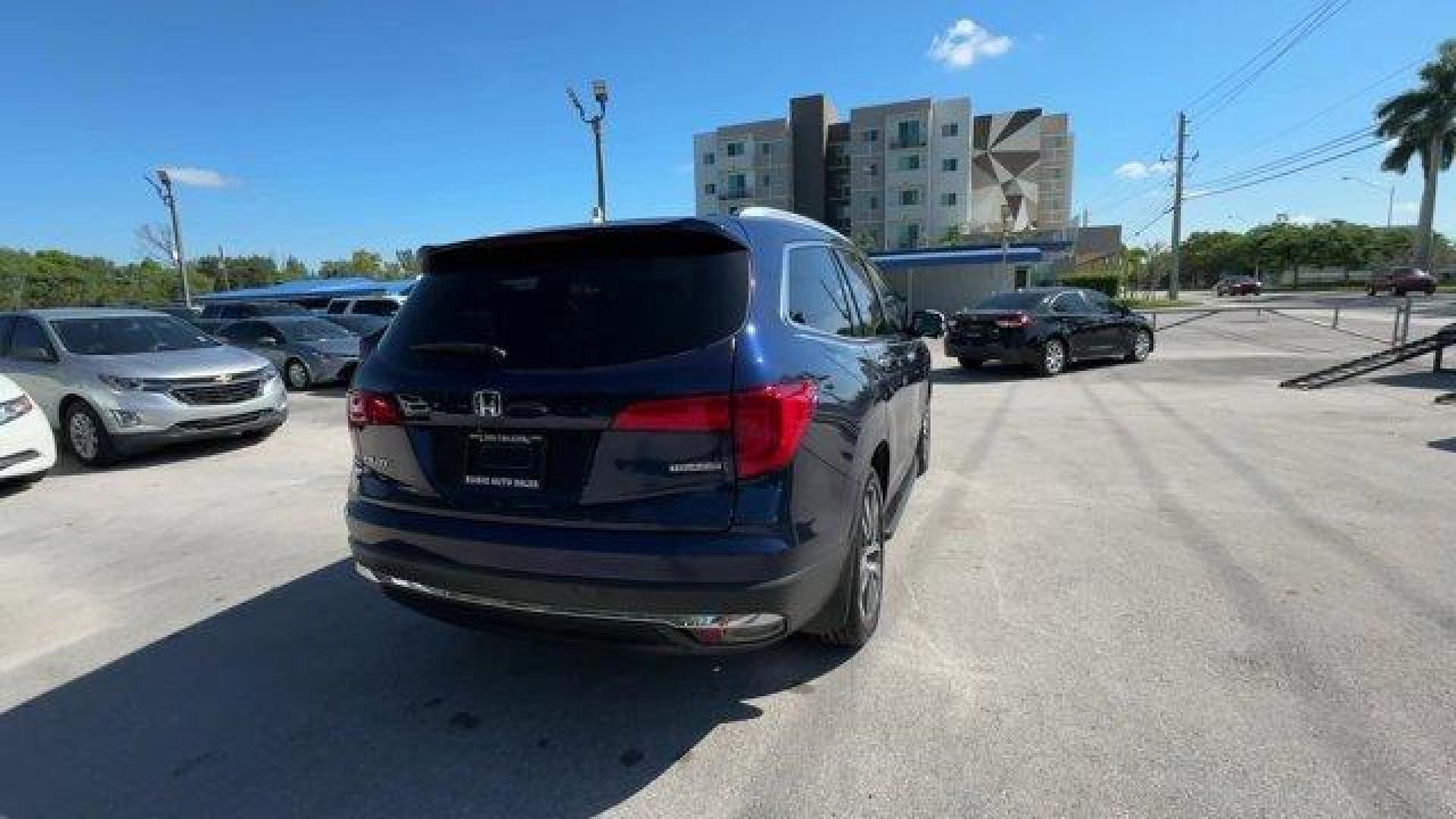 2017 Blue Honda Pilot (5FNYF5H96HB) with an 6 3.5 L engine, Automatic transmission, located at 27610 S Dixie Hwy, Homestead, FL, 33032, (305) 749-2348, 25.510241, -80.438301 - IIHS Top Safety Pick+. Boasts 27 Highway MPG and 20 City MPG! This Honda Pilot boasts a Regular Unleaded V-6 3.5 L/212 engine powering this Automatic transmission. Window Grid Antenna, Wheels: 20 Alloy, Wheels w/Machined Accents.*This Honda Pilot Comes Equipped with These Options *VSA Electronic Sta - Photo#4