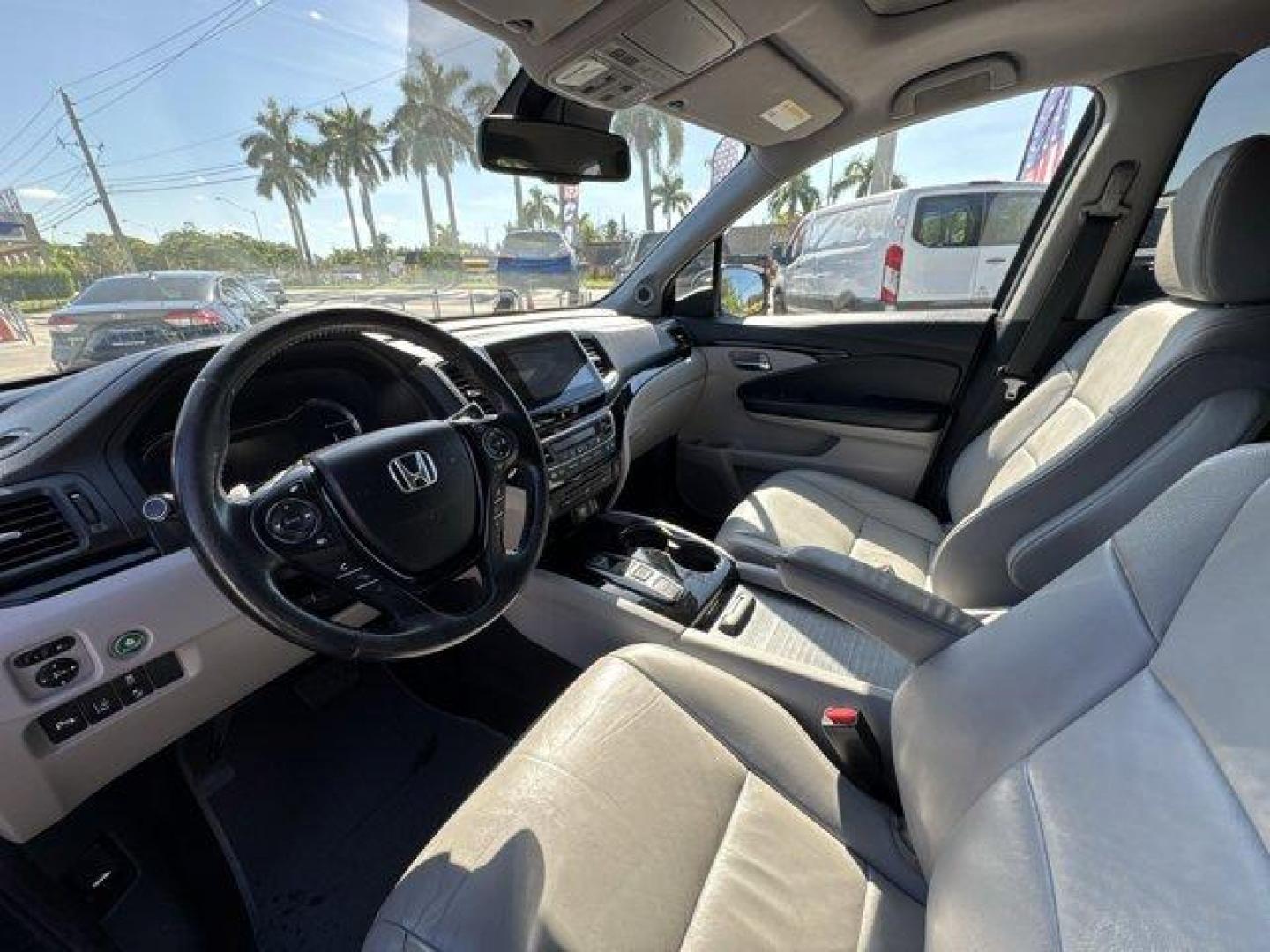 2017 Blue Honda Pilot (5FNYF5H96HB) with an 6 3.5 L engine, Automatic transmission, located at 27610 S Dixie Hwy, Homestead, FL, 33032, (305) 749-2348, 25.510241, -80.438301 - IIHS Top Safety Pick+. Boasts 27 Highway MPG and 20 City MPG! This Honda Pilot boasts a Regular Unleaded V-6 3.5 L/212 engine powering this Automatic transmission. Window Grid Antenna, Wheels: 20 Alloy, Wheels w/Machined Accents.*This Honda Pilot Comes Equipped with These Options *VSA Electronic Sta - Photo#10