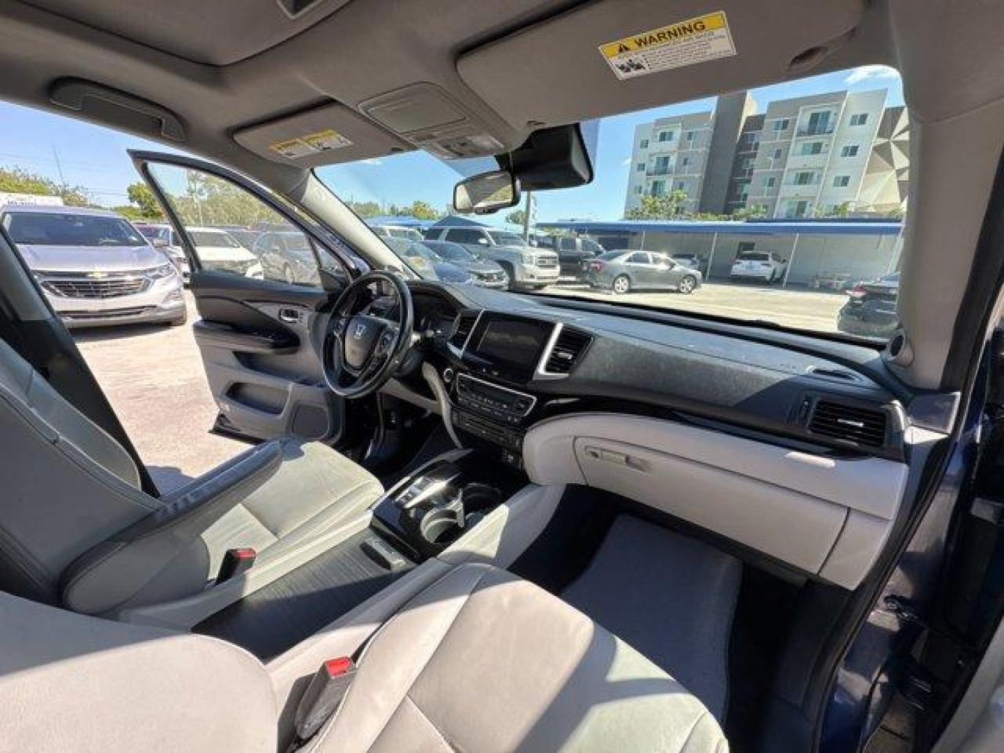 2017 Blue Honda Pilot (5FNYF5H96HB) with an 6 3.5 L engine, Automatic transmission, located at 27610 S Dixie Hwy, Homestead, FL, 33032, (305) 749-2348, 25.510241, -80.438301 - IIHS Top Safety Pick+. Boasts 27 Highway MPG and 20 City MPG! This Honda Pilot boasts a Regular Unleaded V-6 3.5 L/212 engine powering this Automatic transmission. Window Grid Antenna, Wheels: 20 Alloy, Wheels w/Machined Accents.*This Honda Pilot Comes Equipped with These Options *VSA Electronic Sta - Photo#11
