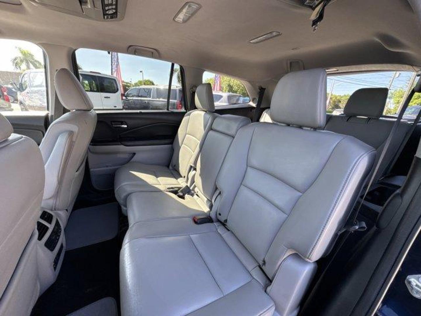 2017 Blue Honda Pilot (5FNYF5H96HB) with an 6 3.5 L engine, Automatic transmission, located at 27610 S Dixie Hwy, Homestead, FL, 33032, (305) 749-2348, 25.510241, -80.438301 - IIHS Top Safety Pick+. Boasts 27 Highway MPG and 20 City MPG! This Honda Pilot boasts a Regular Unleaded V-6 3.5 L/212 engine powering this Automatic transmission. Window Grid Antenna, Wheels: 20 Alloy, Wheels w/Machined Accents.*This Honda Pilot Comes Equipped with These Options *VSA Electronic Sta - Photo#13