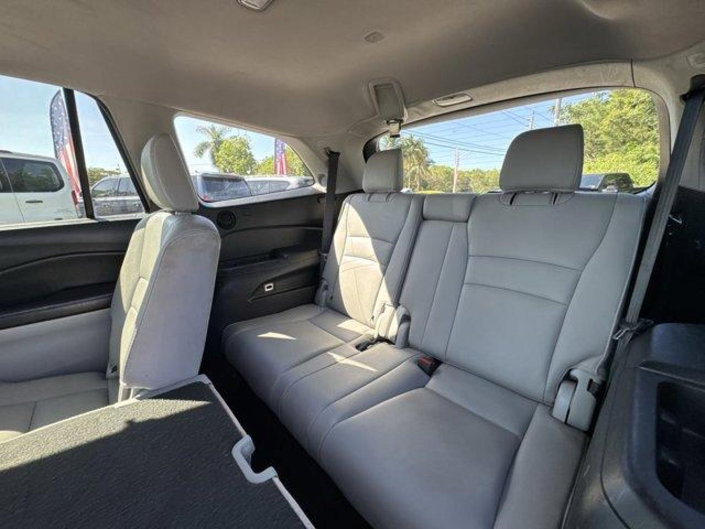 2017 Blue Honda Pilot (5FNYF5H96HB) with an 6 3.5 L engine, Automatic transmission, located at 27610 S Dixie Hwy, Homestead, FL, 33032, (305) 749-2348, 25.510241, -80.438301 - IIHS Top Safety Pick+. Boasts 27 Highway MPG and 20 City MPG! This Honda Pilot boasts a Regular Unleaded V-6 3.5 L/212 engine powering this Automatic transmission. Window Grid Antenna, Wheels: 20 Alloy, Wheels w/Machined Accents.*This Honda Pilot Comes Equipped with These Options *VSA Electronic Sta - Photo#14