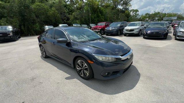 2016 Blue Honda Civic Sedan (19XFC1F36GE) with an 4 1.5 L engine, Variable transmission, located at 27610 S Dixie Hwy, Homestead, FL, 33032, (305) 749-2348, 25.510241, -80.438301 - IIHS Top Safety Pick+. Scores 42 Highway MPG and 31 City MPG! This Honda Civic Sedan delivers a Intercooled Turbo Regular Unleaded I-4 1.5 L/91 engine powering this Variable transmission. Wheels: 17 Alloy, Wheels w/Silver Accents, VSA Electronic Stability Control (ESC).*This Honda Civic Sedan Comes - Photo#6