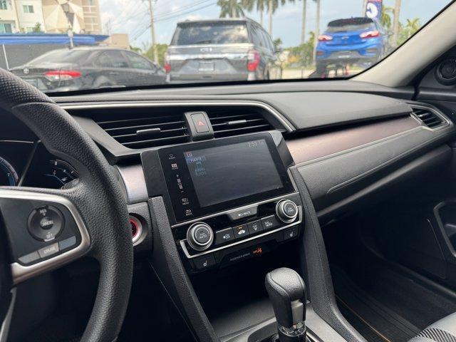 2016 Blue Honda Civic Sedan (19XFC1F36GE) with an 4 1.5 L engine, Variable transmission, located at 27610 S Dixie Hwy, Homestead, FL, 33032, (305) 749-2348, 25.510241, -80.438301 - IIHS Top Safety Pick+. Scores 42 Highway MPG and 31 City MPG! This Honda Civic Sedan delivers a Intercooled Turbo Regular Unleaded I-4 1.5 L/91 engine powering this Variable transmission. Wheels: 17 Alloy, Wheels w/Silver Accents, VSA Electronic Stability Control (ESC).*This Honda Civic Sedan Comes - Photo#8