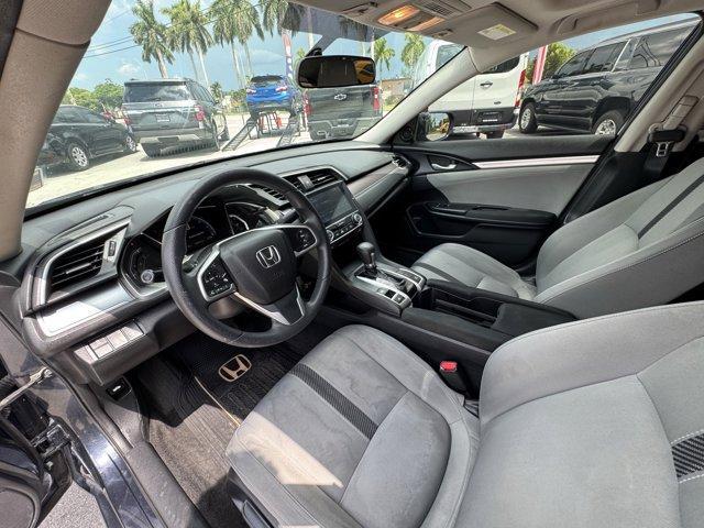 2016 Blue Honda Civic Sedan (19XFC1F36GE) with an 4 1.5 L engine, Variable transmission, located at 27610 S Dixie Hwy, Homestead, FL, 33032, (305) 749-2348, 25.510241, -80.438301 - IIHS Top Safety Pick+. Scores 42 Highway MPG and 31 City MPG! This Honda Civic Sedan delivers a Intercooled Turbo Regular Unleaded I-4 1.5 L/91 engine powering this Variable transmission. Wheels: 17 Alloy, Wheels w/Silver Accents, VSA Electronic Stability Control (ESC).*This Honda Civic Sedan Comes - Photo#9