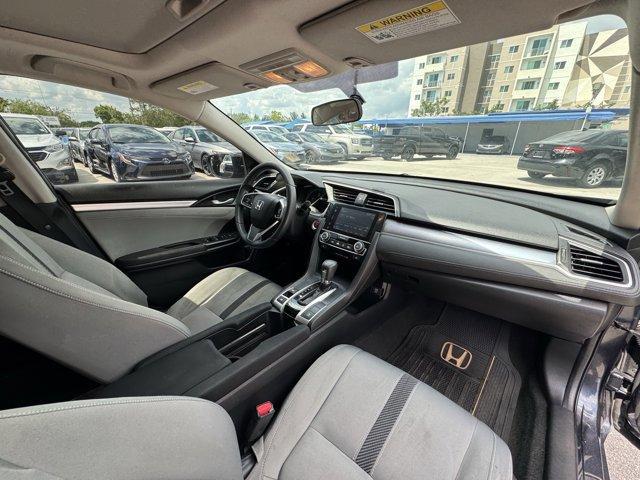2016 Blue Honda Civic Sedan (19XFC1F36GE) with an 4 1.5 L engine, Variable transmission, located at 27610 S Dixie Hwy, Homestead, FL, 33032, (305) 749-2348, 25.510241, -80.438301 - IIHS Top Safety Pick+. Scores 42 Highway MPG and 31 City MPG! This Honda Civic Sedan delivers a Intercooled Turbo Regular Unleaded I-4 1.5 L/91 engine powering this Variable transmission. Wheels: 17 Alloy, Wheels w/Silver Accents, VSA Electronic Stability Control (ESC).*This Honda Civic Sedan Comes - Photo#11