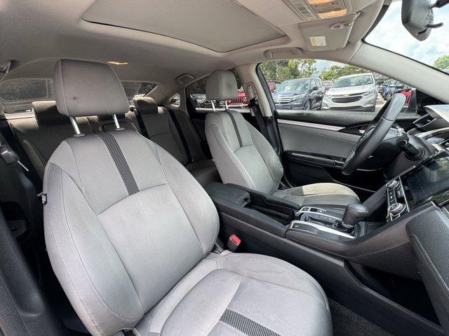 2016 Blue Honda Civic Sedan (19XFC1F36GE) with an 4 1.5 L engine, Variable transmission, located at 27610 S Dixie Hwy, Homestead, FL, 33032, (305) 749-2348, 25.510241, -80.438301 - IIHS Top Safety Pick+. Scores 42 Highway MPG and 31 City MPG! This Honda Civic Sedan delivers a Intercooled Turbo Regular Unleaded I-4 1.5 L/91 engine powering this Variable transmission. Wheels: 17 Alloy, Wheels w/Silver Accents, VSA Electronic Stability Control (ESC).*This Honda Civic Sedan Comes - Photo#12