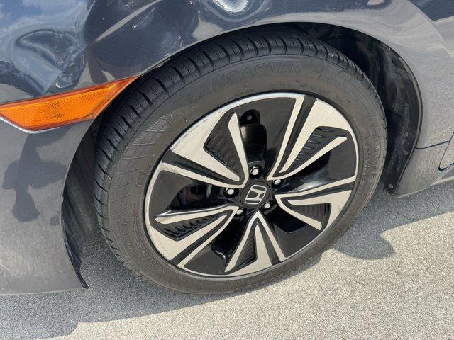 2016 Blue Honda Civic Sedan (19XFC1F36GE) with an 4 1.5 L engine, Variable transmission, located at 27610 S Dixie Hwy, Homestead, FL, 33032, (305) 749-2348, 25.510241, -80.438301 - IIHS Top Safety Pick+. Scores 42 Highway MPG and 31 City MPG! This Honda Civic Sedan delivers a Intercooled Turbo Regular Unleaded I-4 1.5 L/91 engine powering this Variable transmission. Wheels: 17 Alloy, Wheels w/Silver Accents, VSA Electronic Stability Control (ESC).*This Honda Civic Sedan Comes - Photo#17