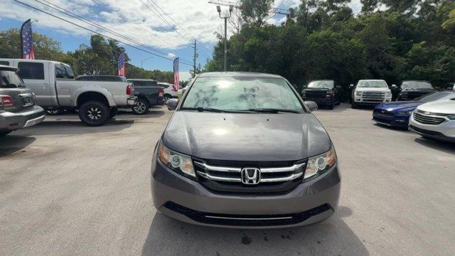 2014 Gray Honda Odyssey (5FNRL5H47EB) with an 6 3.5 L engine, Automatic transmission, located at 27610 S Dixie Hwy, Homestead, FL, 33032, (305) 749-2348, 25.510241, -80.438301 - IIHS Top Safety Pick+. Boasts 28 Highway MPG and 19 City MPG! This Honda Odyssey delivers a Regular Unleaded V-6 3.5 L/212 engine powering this Automatic transmission. Window Grid Antenna, Wheels: 17 x 7 Alloy, VSA Electronic Stability Control (ESC).*This Honda Odyssey Comes Equipped with These Opti - Photo#7