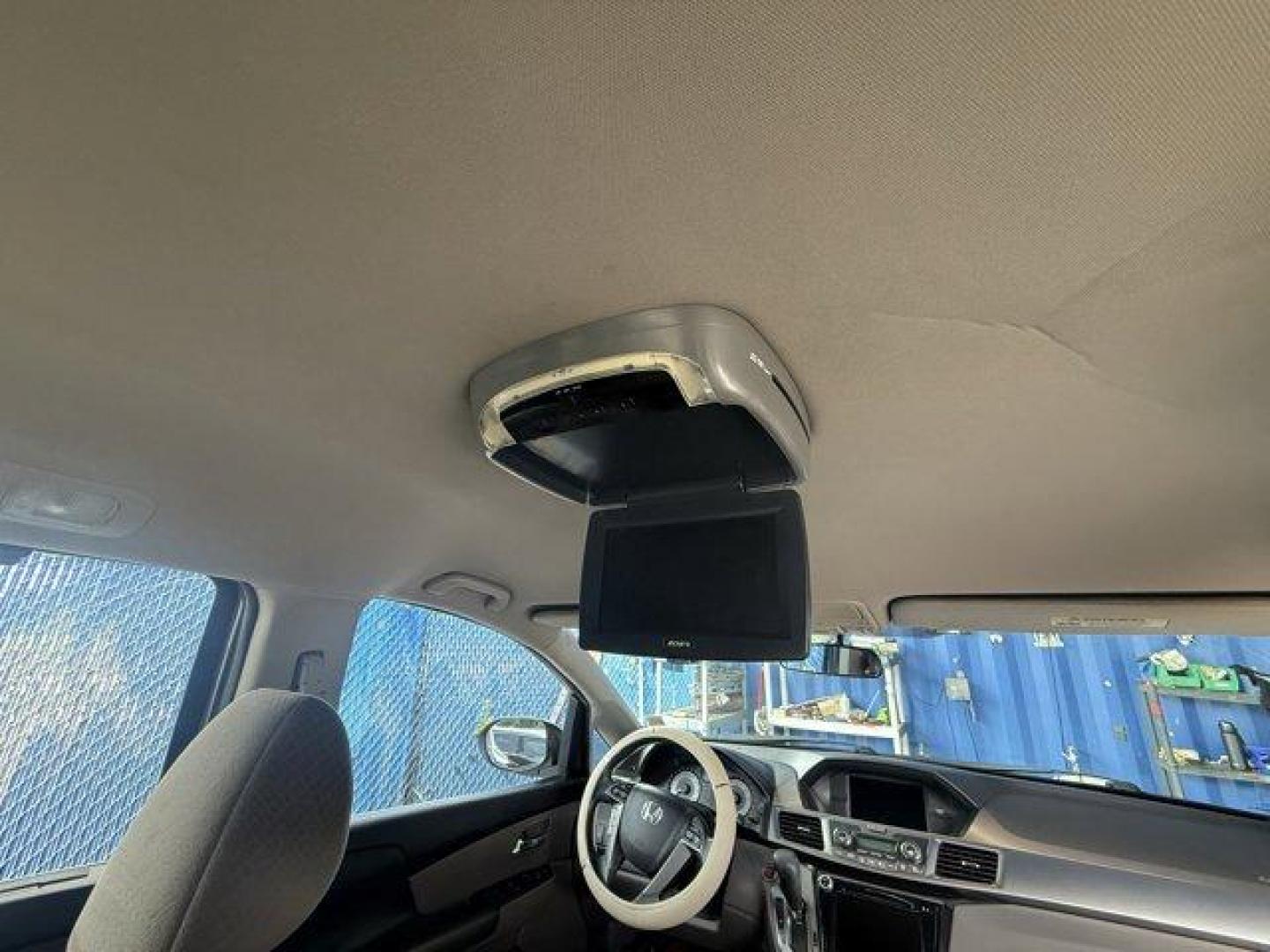 2014 Gray Honda Odyssey (5FNRL5H47EB) with an 6 3.5 L engine, Automatic transmission, located at 27610 S Dixie Hwy, Homestead, FL, 33032, (305) 749-2348, 25.510241, -80.438301 - IIHS Top Safety Pick+. Boasts 28 Highway MPG and 19 City MPG! This Honda Odyssey delivers a Regular Unleaded V-6 3.5 L/212 engine powering this Automatic transmission. Window Grid Antenna, Wheels: 17 x 7 Alloy, VSA Electronic Stability Control (ESC).*This Honda Odyssey Comes Equipped with These Opti - Photo#16