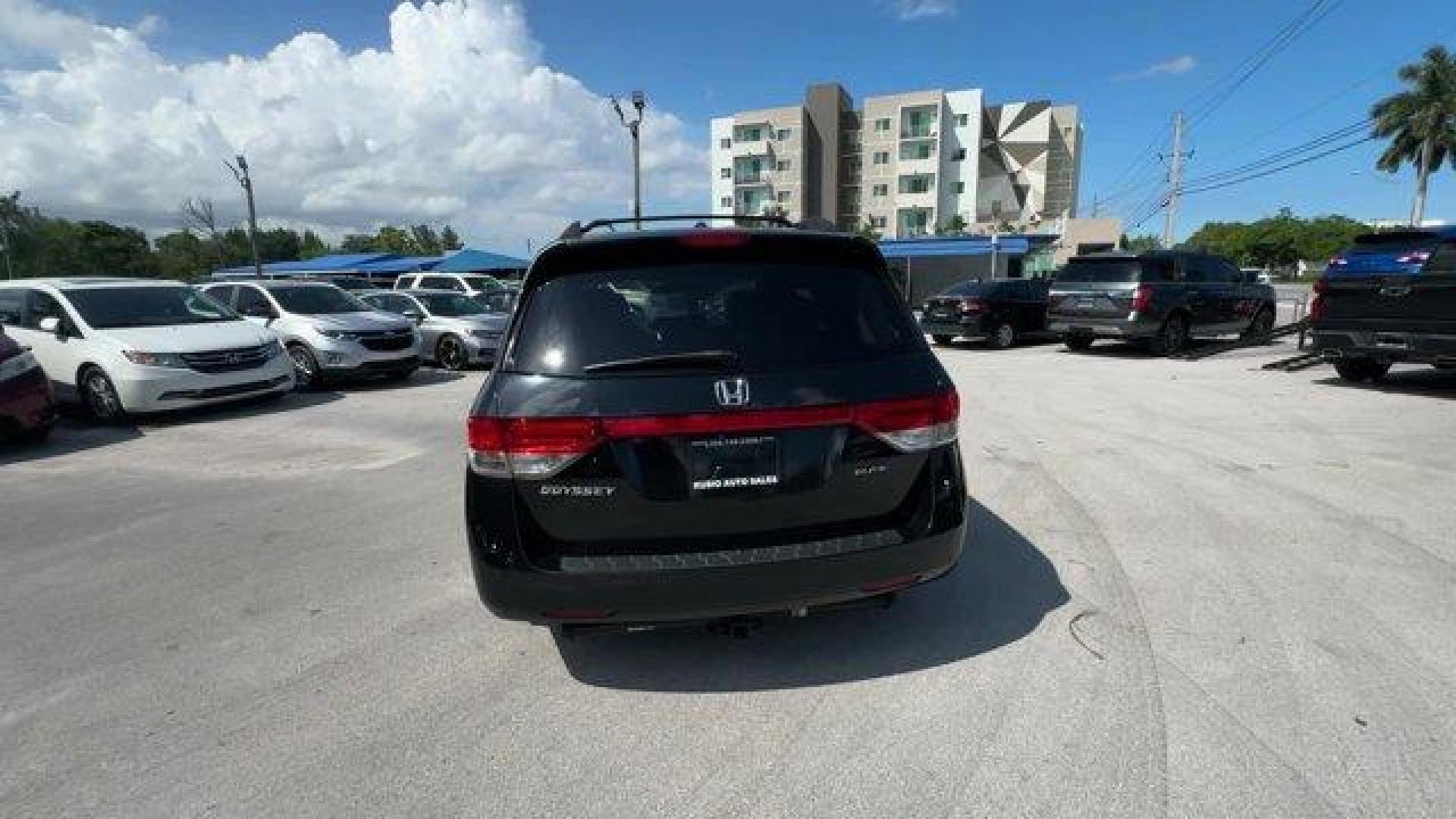 2014 Black Honda Odyssey (5FNRL5H97EB) with an 6 3.5 L engine, Automatic transmission, located at 27610 S Dixie Hwy, Homestead, FL, 33032, (305) 749-2348, 25.510241, -80.438301 - KBB.com 12 Best Family Cars. Scores 28 Highway MPG and 19 City MPG! This Honda Odyssey delivers a Regular Unleaded V-6 3.5 L/212 engine powering this Automatic transmission. Window Grid Antenna, Wheels: 18 x 7 Alloy, VSA Electronic Stability Control (ESC).* This Honda Odyssey Features the Following - Photo#3