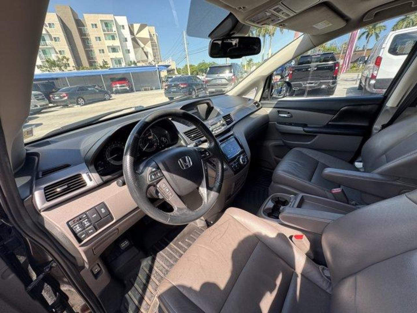 2014 Black Honda Odyssey (5FNRL5H97EB) with an 6 3.5 L engine, Automatic transmission, located at 27610 S Dixie Hwy, Homestead, FL, 33032, (305) 749-2348, 25.510241, -80.438301 - KBB.com 12 Best Family Cars. Scores 28 Highway MPG and 19 City MPG! This Honda Odyssey delivers a Regular Unleaded V-6 3.5 L/212 engine powering this Automatic transmission. Window Grid Antenna, Wheels: 18 x 7 Alloy, VSA Electronic Stability Control (ESC).* This Honda Odyssey Features the Following - Photo#10