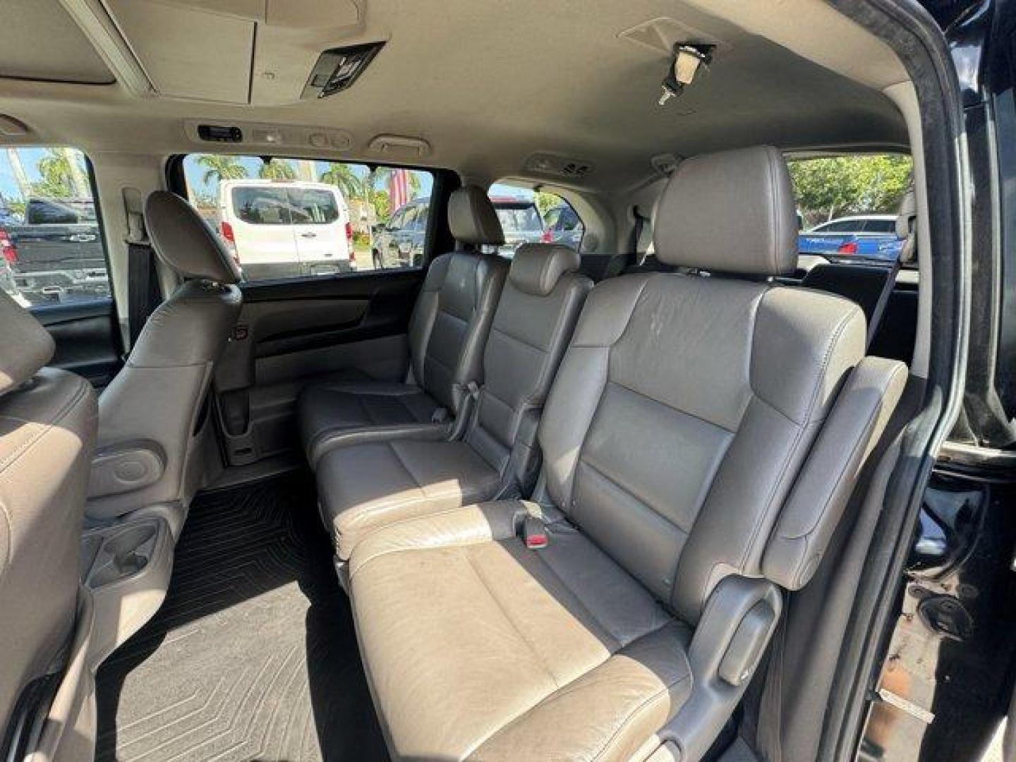 2014 Black Honda Odyssey (5FNRL5H97EB) with an 6 3.5 L engine, Automatic transmission, located at 27610 S Dixie Hwy, Homestead, FL, 33032, (305) 749-2348, 25.510241, -80.438301 - KBB.com 12 Best Family Cars. Scores 28 Highway MPG and 19 City MPG! This Honda Odyssey delivers a Regular Unleaded V-6 3.5 L/212 engine powering this Automatic transmission. Window Grid Antenna, Wheels: 18 x 7 Alloy, VSA Electronic Stability Control (ESC).* This Honda Odyssey Features the Following - Photo#11