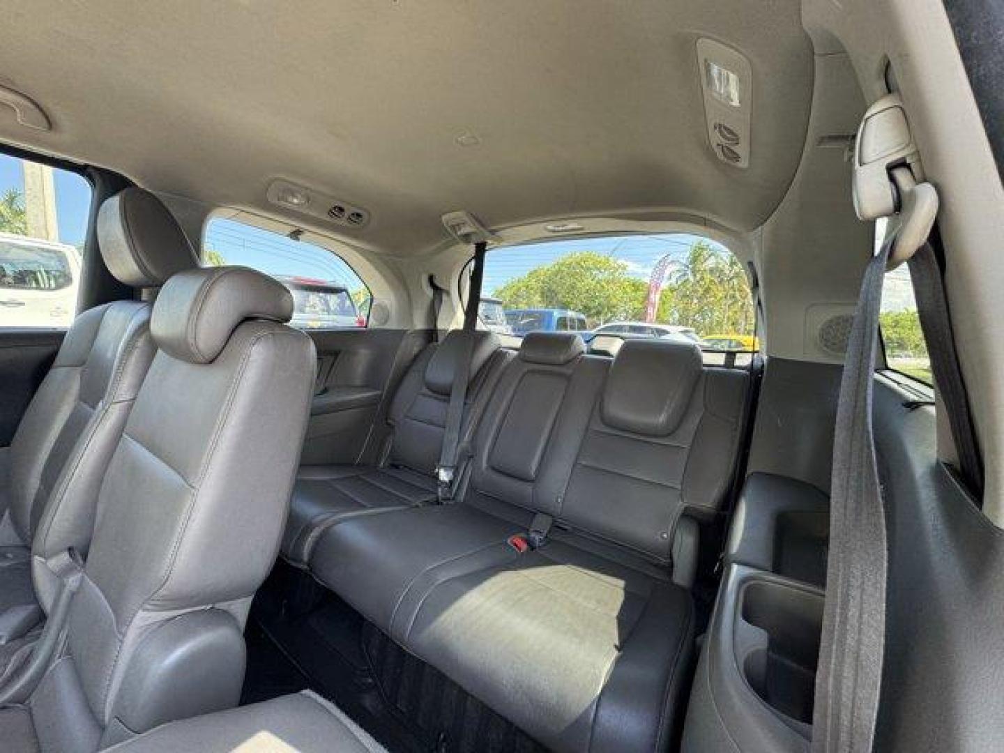 2014 Black Honda Odyssey (5FNRL5H97EB) with an 6 3.5 L engine, Automatic transmission, located at 27610 S Dixie Hwy, Homestead, FL, 33032, (305) 749-2348, 25.510241, -80.438301 - KBB.com 12 Best Family Cars. Scores 28 Highway MPG and 19 City MPG! This Honda Odyssey delivers a Regular Unleaded V-6 3.5 L/212 engine powering this Automatic transmission. Window Grid Antenna, Wheels: 18 x 7 Alloy, VSA Electronic Stability Control (ESC).* This Honda Odyssey Features the Following - Photo#12