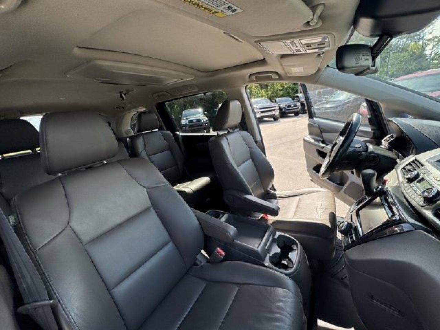 2014 Black Honda Odyssey (5FNRL5H97EB) with an 6 3.5 L engine, Automatic transmission, located at 27610 S Dixie Hwy, Homestead, FL, 33032, (305) 749-2348, 25.510241, -80.438301 - KBB.com 12 Best Family Cars. Scores 28 Highway MPG and 19 City MPG! This Honda Odyssey delivers a Regular Unleaded V-6 3.5 L/212 engine powering this Automatic transmission. Window Grid Antenna, Wheels: 18 x 7 Alloy, VSA Electronic Stability Control (ESC).* This Honda Odyssey Features the Following - Photo#14