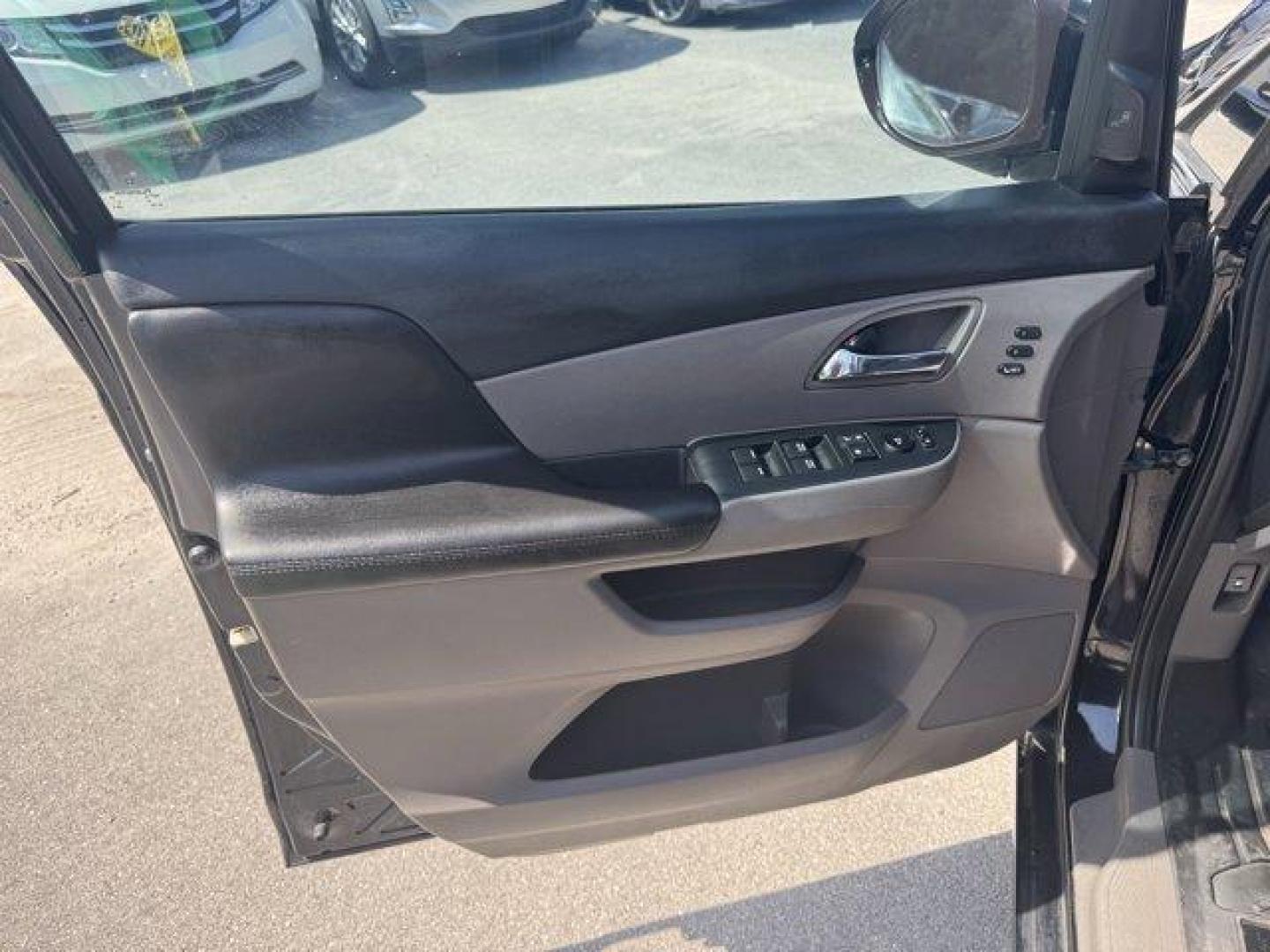 2014 Black Honda Odyssey (5FNRL5H97EB) with an 6 3.5 L engine, Automatic transmission, located at 27610 S Dixie Hwy, Homestead, FL, 33032, (305) 749-2348, 25.510241, -80.438301 - KBB.com 12 Best Family Cars. Scores 28 Highway MPG and 19 City MPG! This Honda Odyssey delivers a Regular Unleaded V-6 3.5 L/212 engine powering this Automatic transmission. Window Grid Antenna, Wheels: 18 x 7 Alloy, VSA Electronic Stability Control (ESC).* This Honda Odyssey Features the Following - Photo#15