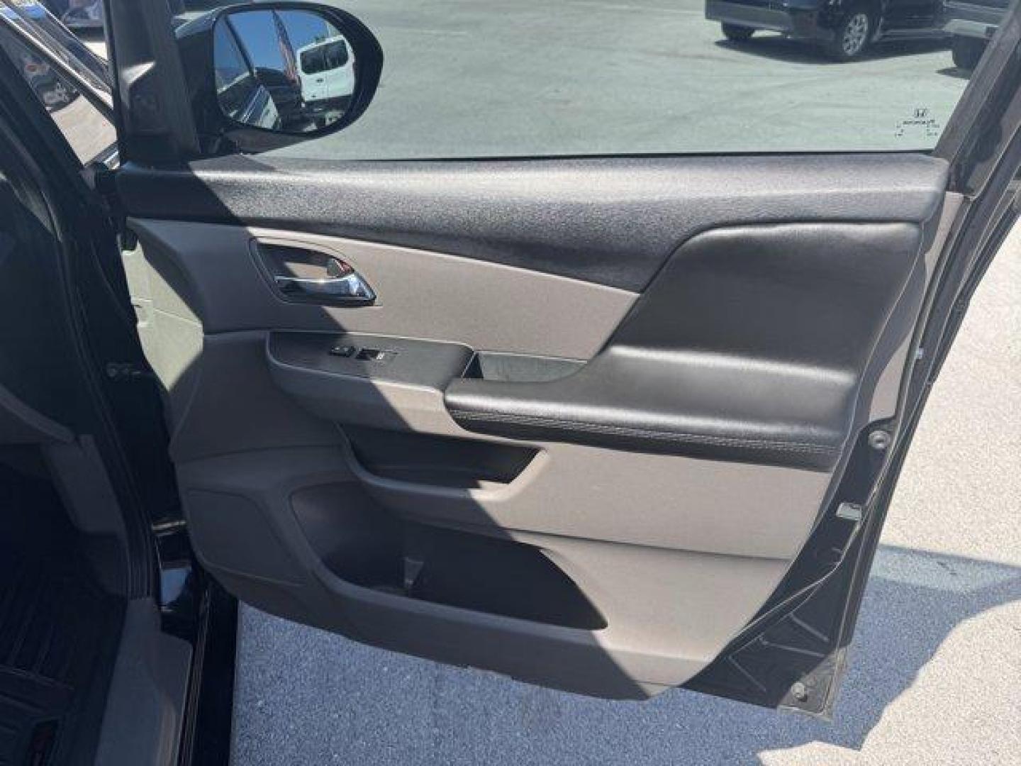 2014 Black Honda Odyssey (5FNRL5H97EB) with an 6 3.5 L engine, Automatic transmission, located at 27610 S Dixie Hwy, Homestead, FL, 33032, (305) 749-2348, 25.510241, -80.438301 - KBB.com 12 Best Family Cars. Scores 28 Highway MPG and 19 City MPG! This Honda Odyssey delivers a Regular Unleaded V-6 3.5 L/212 engine powering this Automatic transmission. Window Grid Antenna, Wheels: 18 x 7 Alloy, VSA Electronic Stability Control (ESC).* This Honda Odyssey Features the Following - Photo#16