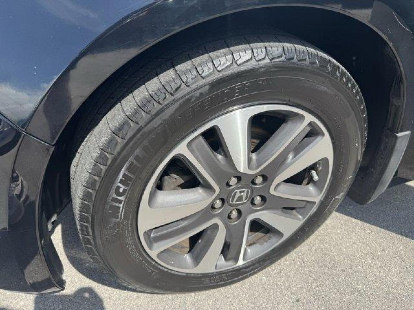 2014 Black Honda Odyssey (5FNRL5H97EB) with an 6 3.5 L engine, Automatic transmission, located at 27610 S Dixie Hwy, Homestead, FL, 33032, (305) 749-2348, 25.510241, -80.438301 - KBB.com 12 Best Family Cars. Scores 28 Highway MPG and 19 City MPG! This Honda Odyssey delivers a Regular Unleaded V-6 3.5 L/212 engine powering this Automatic transmission. Window Grid Antenna, Wheels: 18 x 7 Alloy, VSA Electronic Stability Control (ESC).* This Honda Odyssey Features the Following - Photo#17