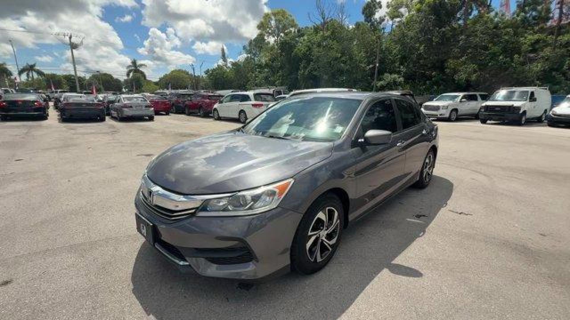 2016 Gray Honda Accord Sedan (1HGCR2F39GA) with an 4 2.4 L engine, Variable transmission, located at 27610 S Dixie Hwy, Homestead, FL, 33032, (305) 749-2348, 25.510241, -80.438301 - KBB.com Brand Image Awards. Scores 37 Highway MPG and 27 City MPG! This Honda Accord Sedan delivers a Regular Unleaded I-4 2.4 L/144 engine powering this Variable transmission. Window Grid Antenna, Wheels: 16 Alloy, VSA Electronic Stability Control (ESC).*This Honda Accord Sedan Comes Equipped with - Photo#0