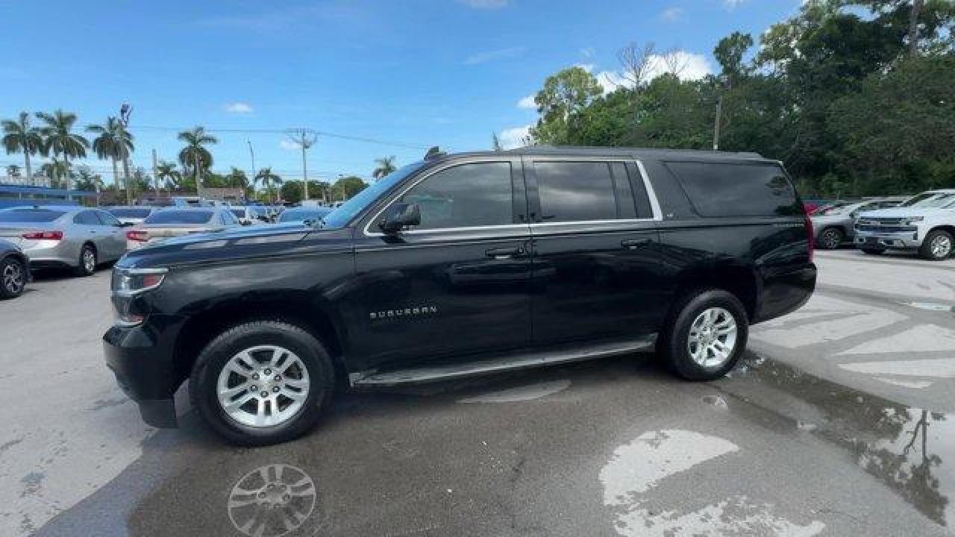 2016 Black /Jet Black Chevrolet Suburban (1GNSCHKC7GR) with an 8 5.3L engine, Automatic transmission, located at 27610 S Dixie Hwy, Homestead, FL, 33032, (305) 749-2348, 25.510241, -80.438301 - Delivers 23 Highway MPG and 16 City MPG! This Chevrolet Suburban boasts a Gas/Ethanol V8 5.3L/ engine powering this Automatic transmission. WHEELS, 18 X 8.5 (45.7 CM X 21.6 CM) ALUMINUM WITH HIGH-POLISHED FINISH (STD), TRANSMISSION, 6-SPEED AUTOMATIC, ELECTRONICALLY CONTROLLED with overdrive and tow - Photo#1