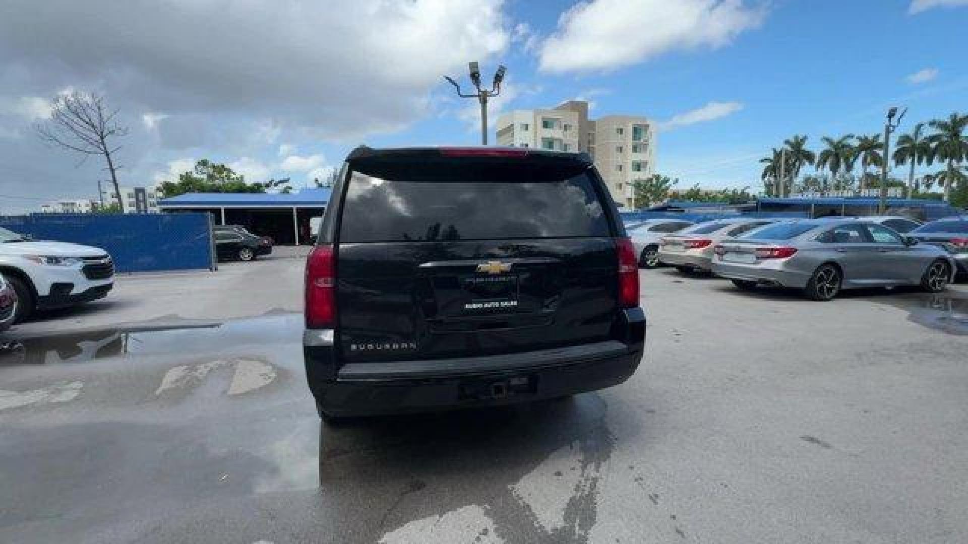 2016 Black /Jet Black Chevrolet Suburban (1GNSCHKC7GR) with an 8 5.3L engine, Automatic transmission, located at 27610 S Dixie Hwy, Homestead, FL, 33032, (305) 749-2348, 25.510241, -80.438301 - Delivers 23 Highway MPG and 16 City MPG! This Chevrolet Suburban boasts a Gas/Ethanol V8 5.3L/ engine powering this Automatic transmission. WHEELS, 18 X 8.5 (45.7 CM X 21.6 CM) ALUMINUM WITH HIGH-POLISHED FINISH (STD), TRANSMISSION, 6-SPEED AUTOMATIC, ELECTRONICALLY CONTROLLED with overdrive and tow - Photo#3