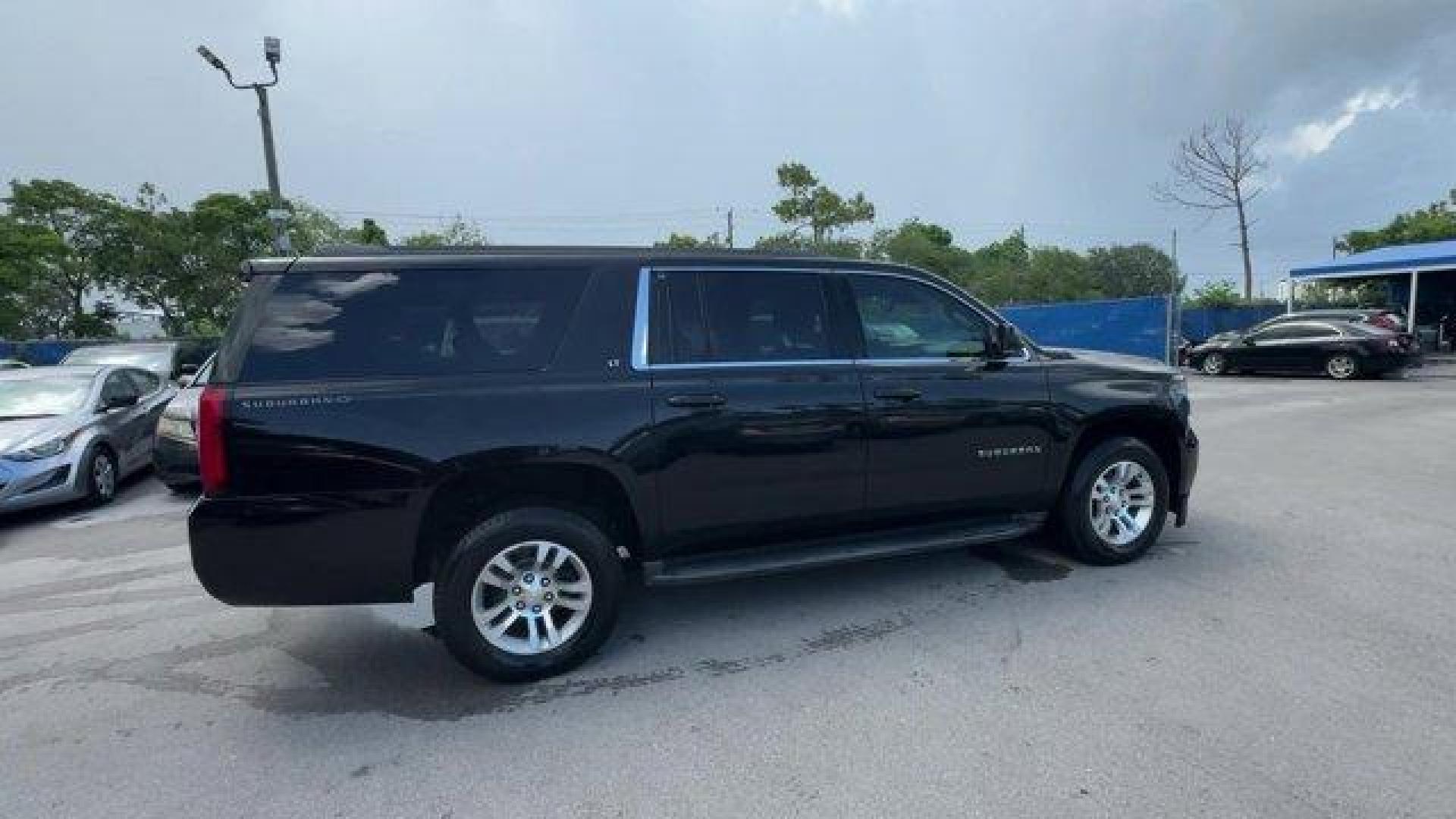 2016 Black /Jet Black Chevrolet Suburban (1GNSCHKC7GR) with an 8 5.3L engine, Automatic transmission, located at 27610 S Dixie Hwy, Homestead, FL, 33032, (305) 749-2348, 25.510241, -80.438301 - Delivers 23 Highway MPG and 16 City MPG! This Chevrolet Suburban boasts a Gas/Ethanol V8 5.3L/ engine powering this Automatic transmission. WHEELS, 18 X 8.5 (45.7 CM X 21.6 CM) ALUMINUM WITH HIGH-POLISHED FINISH (STD), TRANSMISSION, 6-SPEED AUTOMATIC, ELECTRONICALLY CONTROLLED with overdrive and tow - Photo#5