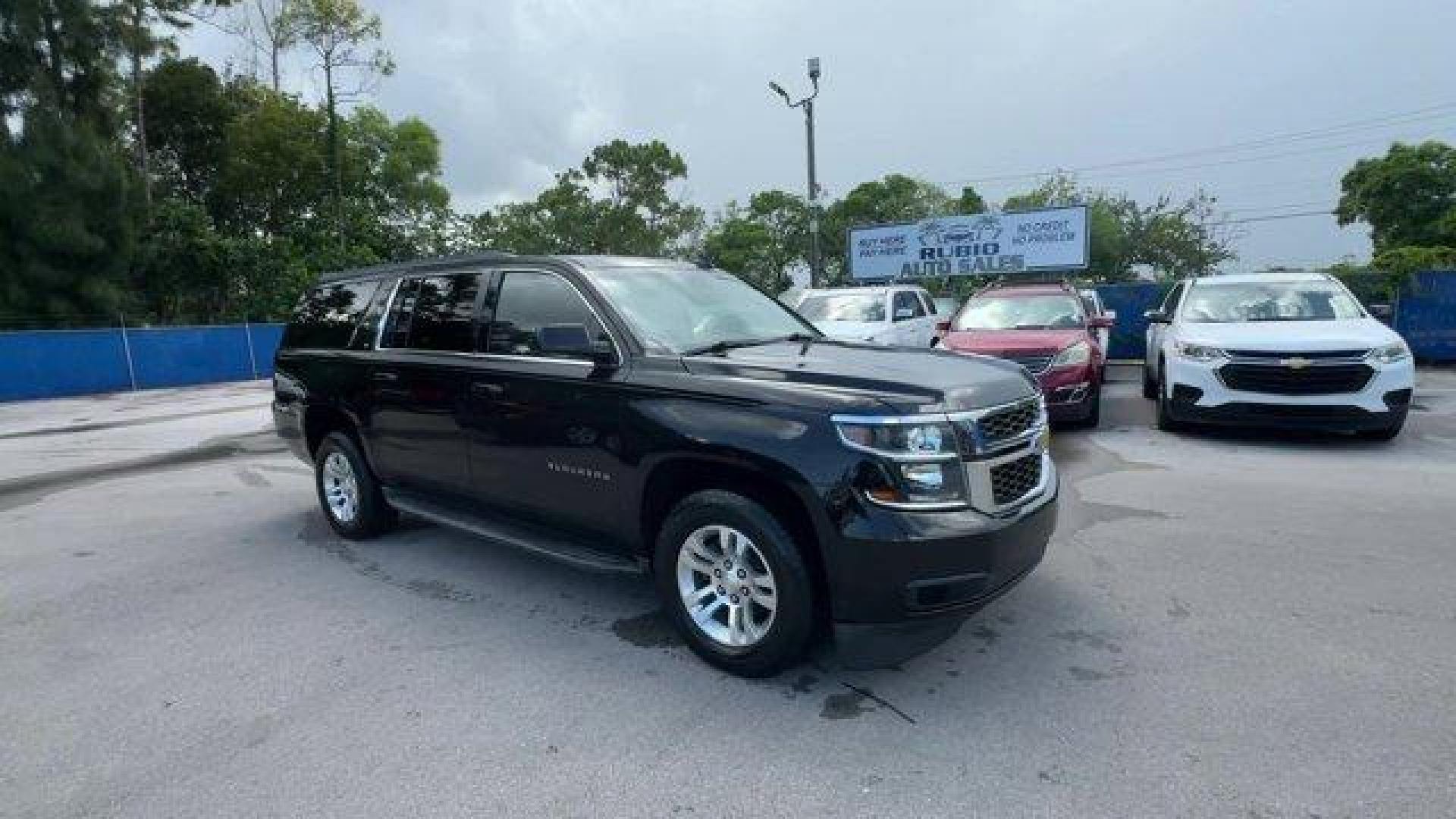2016 Black /Jet Black Chevrolet Suburban (1GNSCHKC7GR) with an 8 5.3L engine, Automatic transmission, located at 27610 S Dixie Hwy, Homestead, FL, 33032, (305) 749-2348, 25.510241, -80.438301 - Delivers 23 Highway MPG and 16 City MPG! This Chevrolet Suburban boasts a Gas/Ethanol V8 5.3L/ engine powering this Automatic transmission. WHEELS, 18 X 8.5 (45.7 CM X 21.6 CM) ALUMINUM WITH HIGH-POLISHED FINISH (STD), TRANSMISSION, 6-SPEED AUTOMATIC, ELECTRONICALLY CONTROLLED with overdrive and tow - Photo#6