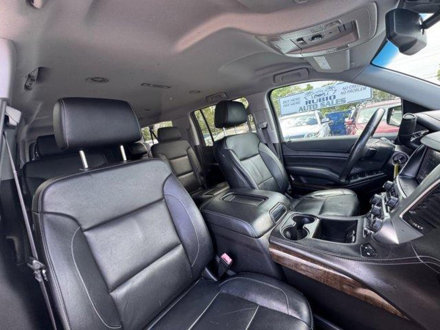 2016 Black /Jet Black Chevrolet Suburban (1GNSCHKC7GR) with an 8 5.3L engine, Automatic transmission, located at 27610 S Dixie Hwy, Homestead, FL, 33032, (305) 749-2348, 25.510241, -80.438301 - Delivers 23 Highway MPG and 16 City MPG! This Chevrolet Suburban boasts a Gas/Ethanol V8 5.3L/ engine powering this Automatic transmission. WHEELS, 18 X 8.5 (45.7 CM X 21.6 CM) ALUMINUM WITH HIGH-POLISHED FINISH (STD), TRANSMISSION, 6-SPEED AUTOMATIC, ELECTRONICALLY CONTROLLED with overdrive and tow - Photo#12