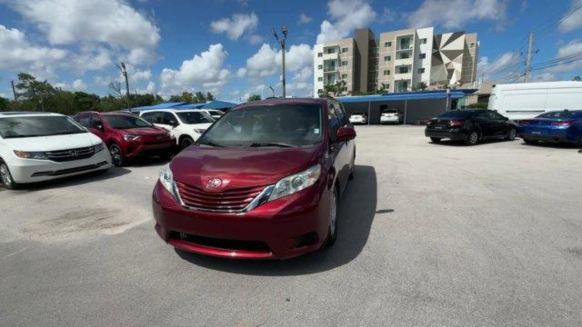 2015 Red Toyota Sienna (5TDKK3DCXFS) with an 6 3.5 L engine, Automatic transmission, located at 27610 S Dixie Hwy, Homestead, FL, 33032, (305) 749-2348, 25.510241, -80.438301 - KBB.com Best Resale Value Awards. Boasts 25 Highway MPG and 18 City MPG! This Toyota Sienna delivers a Regular Unleaded V-6 3.5 L/211 engine powering this Automatic transmission. Window Grid And Roof Mount Diversity Antenna, Vinyl Door Trim Insert, Variable Intermittent Wipers w/Heated Wiper Park.* - Photo#0