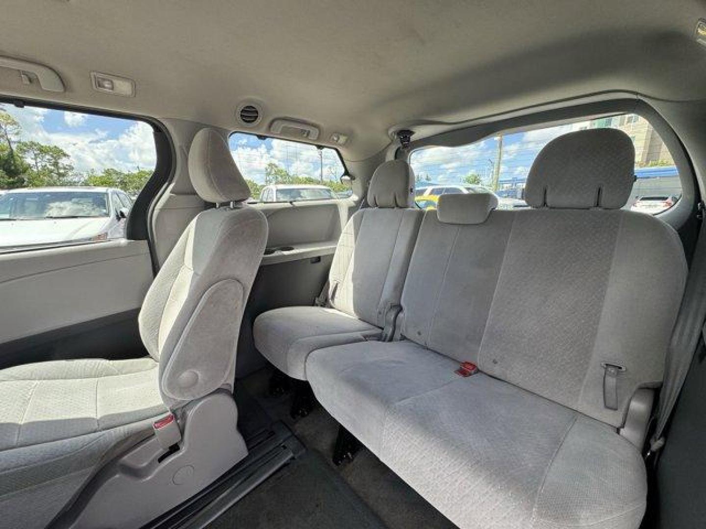 2015 Red Toyota Sienna (5TDKK3DCXFS) with an 6 3.5 L engine, Automatic transmission, located at 27610 S Dixie Hwy, Homestead, FL, 33032, (305) 749-2348, 25.510241, -80.438301 - KBB.com Best Resale Value Awards. Boasts 25 Highway MPG and 18 City MPG! This Toyota Sienna delivers a Regular Unleaded V-6 3.5 L/211 engine powering this Automatic transmission. Window Grid And Roof Mount Diversity Antenna, Vinyl Door Trim Insert, Variable Intermittent Wipers w/Heated Wiper Park.* - Photo#14