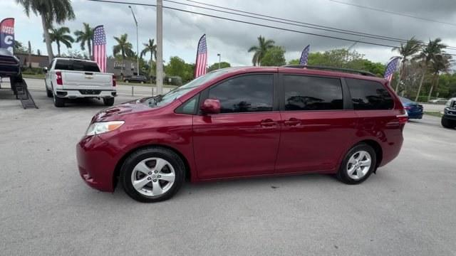 2015 Red Toyota Sienna (5TDKK3DCXFS) with an 6 3.5 L engine, Automatic transmission, located at 27610 S Dixie Hwy, Homestead, FL, 33032, (305) 749-2348, 25.510241, -80.438301 - KBB.com Best Resale Value Awards. Boasts 25 Highway MPG and 18 City MPG! This Toyota Sienna delivers a Regular Unleaded V-6 3.5 L/211 engine powering this Automatic transmission. Window Grid And Roof Mount Diversity Antenna, Vinyl Door Trim Insert, Variable Intermittent Wipers w/Heated Wiper Park.* - Photo#1