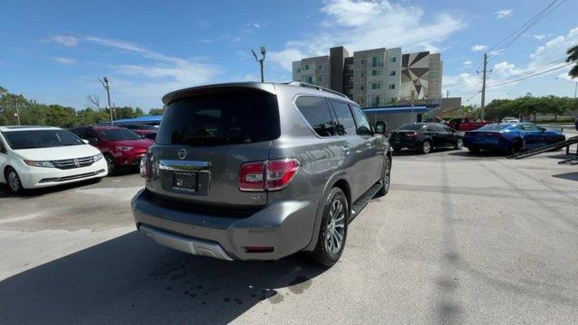 2018 Gun Metallic /Charcoal Nissan Armada (JN8AY2ND2JX) with an 8 5.6 L engine, Automatic transmission, located at 27610 S Dixie Hwy, Homestead, FL, 33032, (305) 749-2348, 25.510241, -80.438301 - Only 82,245 Miles! Scores 19 Highway MPG and 14 City MPG! This Nissan Armada boasts a Regular Unleaded V-8 5.6 L/339 engine powering this Automatic transmission. GUN METALLIC, CHARCOAL, LEATHER-APPOINTED SEAT TRIM, [Z66] ACTIVATION DISCLAIMER.*This Nissan Armada Comes Equipped with These Options *Wi - Photo#4