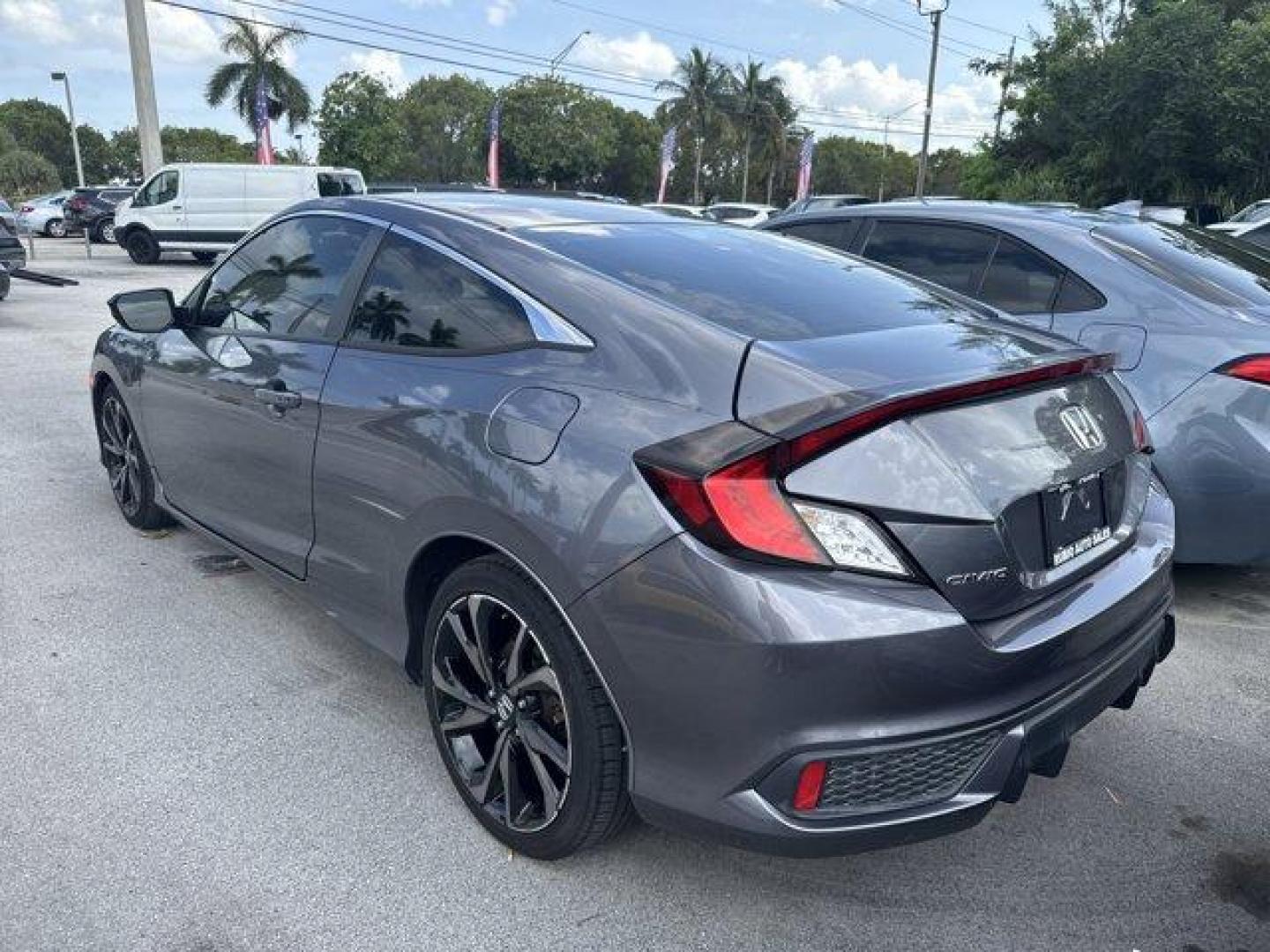 2020 Gray Honda Civic Coupe (2HGFC4B83LH) with an 4 2.0 L engine, Variable transmission, located at 27610 S Dixie Hwy, Homestead, FL, 33032, (305) 749-2348, 25.510241, -80.438301 - Only 32,352 Miles! Scores 36 Highway MPG and 29 City MPG! This Honda Civic Coupe boasts a Regular Unleaded I-4 2.0 L/122 engine powering this Variable transmission. Window Grid Antenna, Wheels: 18 Alloy w/Gloss Black Inserts, VSA Electronic Stability Control (ESC).*This Honda Civic Coupe Comes Equip - Photo#1