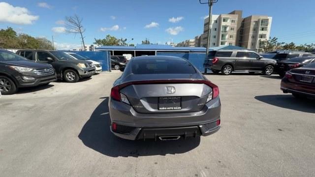 2020 Gray Honda Civic Coupe (2HGFC4B83LH) with an 4 2.0 L engine, Variable transmission, located at 27610 S Dixie Hwy, Homestead, FL, 33032, (305) 749-2348, 25.510241, -80.438301 - Only 32,352 Miles! Scores 36 Highway MPG and 29 City MPG! This Honda Civic Coupe boasts a Regular Unleaded I-4 2.0 L/122 engine powering this Variable transmission. Window Grid Antenna, Wheels: 18 Alloy w/Gloss Black Inserts, VSA Electronic Stability Control (ESC).*This Honda Civic Coupe Comes Equip - Photo#3