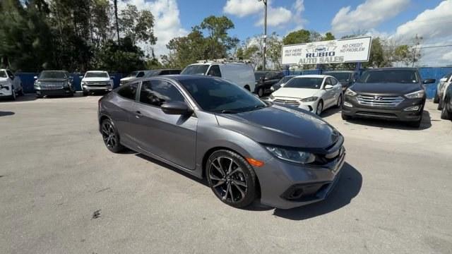 2020 Gray Honda Civic Coupe (2HGFC4B83LH) with an 4 2.0 L engine, Variable transmission, located at 27610 S Dixie Hwy, Homestead, FL, 33032, (305) 749-2348, 25.510241, -80.438301 - Only 32,352 Miles! Scores 36 Highway MPG and 29 City MPG! This Honda Civic Coupe boasts a Regular Unleaded I-4 2.0 L/122 engine powering this Variable transmission. Window Grid Antenna, Wheels: 18 Alloy w/Gloss Black Inserts, VSA Electronic Stability Control (ESC).*This Honda Civic Coupe Comes Equip - Photo#6