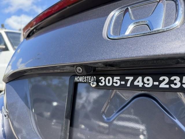 2020 Gray Honda Civic Coupe (2HGFC4B83LH) with an 4 2.0 L engine, Variable transmission, located at 27610 S Dixie Hwy, Homestead, FL, 33032, (305) 749-2348, 25.510241, -80.438301 - Only 32,352 Miles! Scores 36 Highway MPG and 29 City MPG! This Honda Civic Coupe boasts a Regular Unleaded I-4 2.0 L/122 engine powering this Variable transmission. Window Grid Antenna, Wheels: 18 Alloy w/Gloss Black Inserts, VSA Electronic Stability Control (ESC).*This Honda Civic Coupe Comes Equip - Photo#16