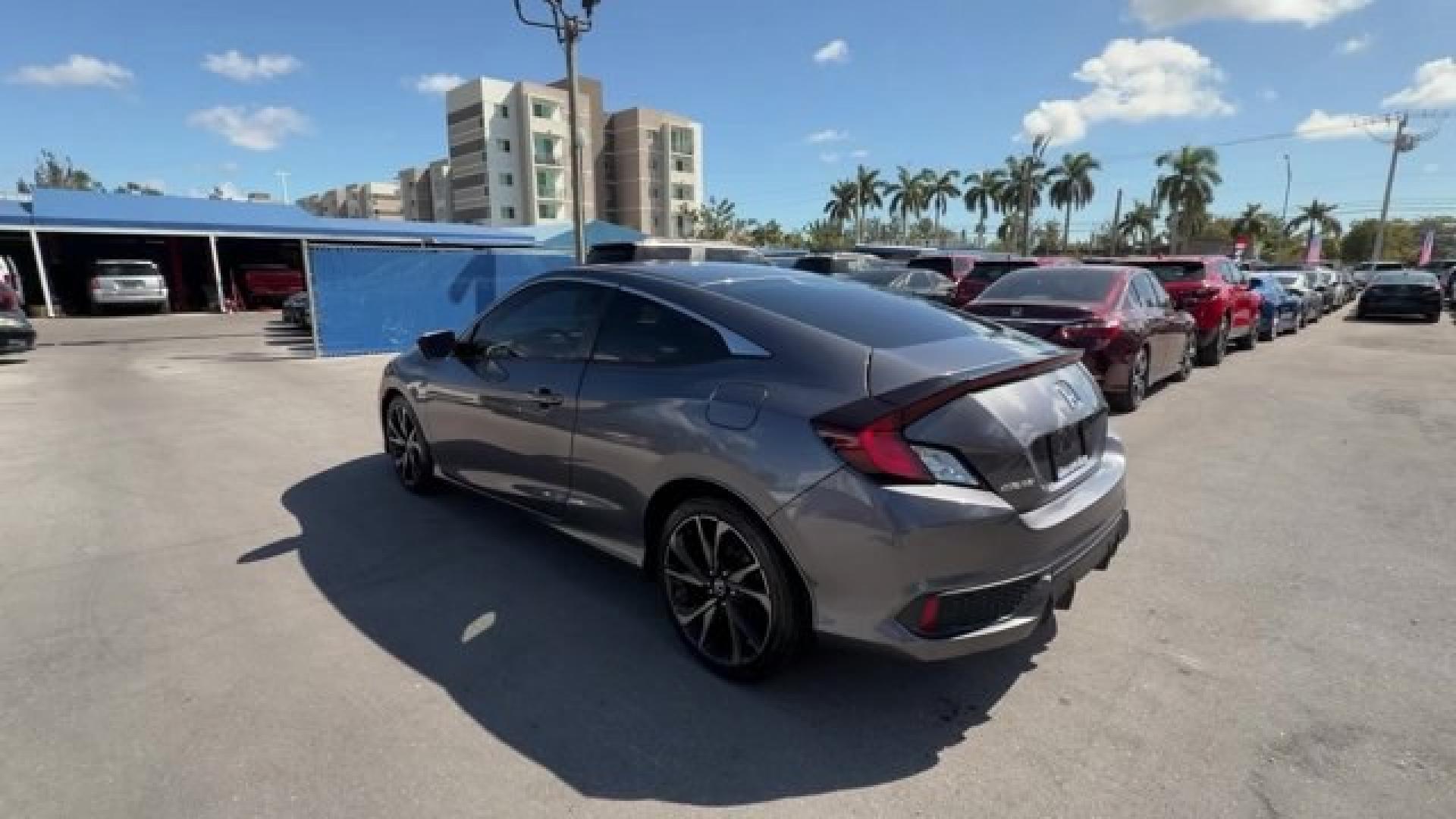 2020 Gray Honda Civic Coupe (2HGFC4B83LH) with an 4 2.0 L engine, Variable transmission, located at 27610 S Dixie Hwy, Homestead, FL, 33032, (305) 749-2348, 25.510241, -80.438301 - Only 32,352 Miles! Scores 36 Highway MPG and 29 City MPG! This Honda Civic Coupe boasts a Regular Unleaded I-4 2.0 L/122 engine powering this Variable transmission. Window Grid Antenna, Wheels: 18 Alloy w/Gloss Black Inserts, VSA Electronic Stability Control (ESC).*This Honda Civic Coupe Comes Equip - Photo#2