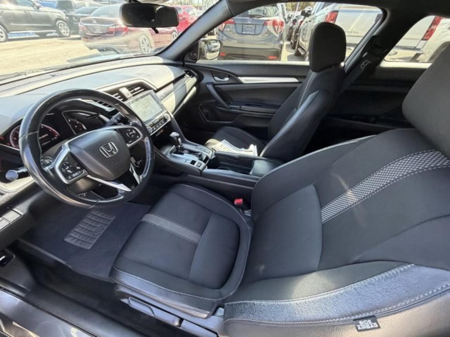 2020 Gray Honda Civic Coupe (2HGFC4B83LH) with an 4 2.0 L engine, Variable transmission, located at 27610 S Dixie Hwy, Homestead, FL, 33032, (305) 749-2348, 25.510241, -80.438301 - Only 32,352 Miles! Scores 36 Highway MPG and 29 City MPG! This Honda Civic Coupe boasts a Regular Unleaded I-4 2.0 L/122 engine powering this Variable transmission. Window Grid Antenna, Wheels: 18 Alloy w/Gloss Black Inserts, VSA Electronic Stability Control (ESC).*This Honda Civic Coupe Comes Equip - Photo#11
