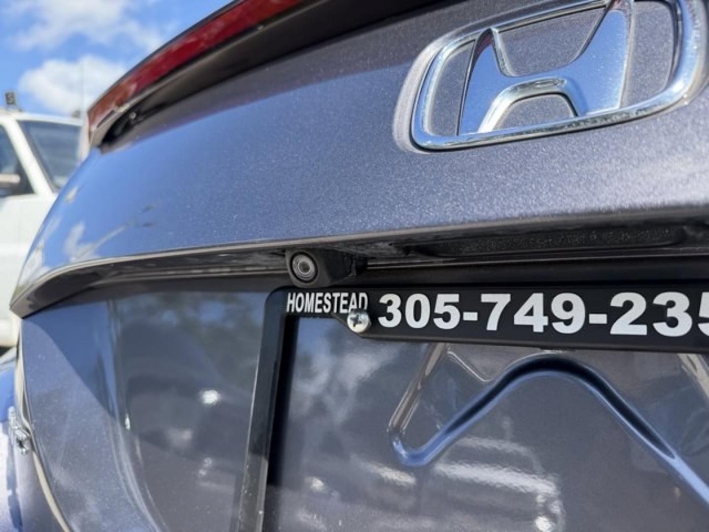 2020 Gray Honda Civic Coupe (2HGFC4B83LH) with an 4 2.0 L engine, Variable transmission, located at 27610 S Dixie Hwy, Homestead, FL, 33032, (305) 749-2348, 25.510241, -80.438301 - Only 32,352 Miles! Scores 36 Highway MPG and 29 City MPG! This Honda Civic Coupe boasts a Regular Unleaded I-4 2.0 L/122 engine powering this Variable transmission. Window Grid Antenna, Wheels: 18 Alloy w/Gloss Black Inserts, VSA Electronic Stability Control (ESC).*This Honda Civic Coupe Comes Equip - Photo#16