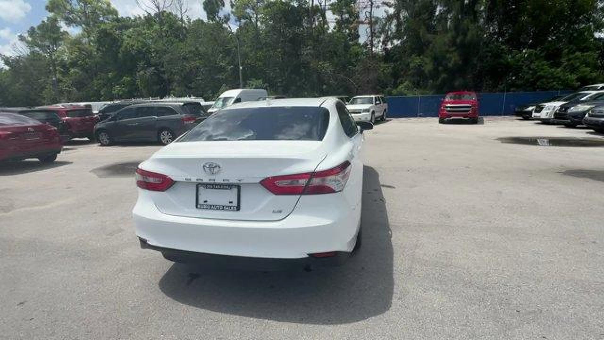 2020 White Toyota Camry (4T1C11AK3LU) with an 4 2.5 L engine, Automatic transmission, located at 27610 S Dixie Hwy, Homestead, FL, 33032, (305) 749-2348, 25.510241, -80.438301 - Boasts 39 Highway MPG and 28 City MPG! This Toyota Camry boasts a Regular Unleaded I-4 2.5 L/152 engine powering this Automatic transmission. Window Grid And Roof Mount Antenna, Variable Intermittent Wipers, Valet Function.* This Toyota Camry Features the Following Options *Urethane Gear Shifter Mat - Photo#4