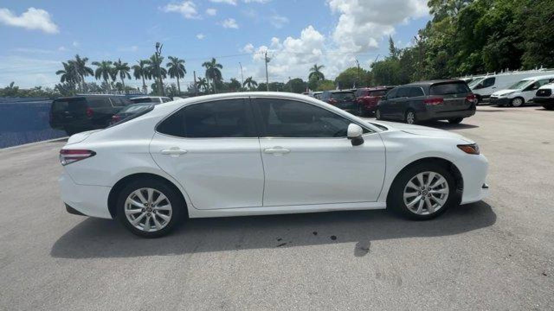 2020 White Toyota Camry (4T1C11AK3LU) with an 4 2.5 L engine, Automatic transmission, located at 27610 S Dixie Hwy, Homestead, FL, 33032, (305) 749-2348, 25.510241, -80.438301 - Boasts 39 Highway MPG and 28 City MPG! This Toyota Camry boasts a Regular Unleaded I-4 2.5 L/152 engine powering this Automatic transmission. Window Grid And Roof Mount Antenna, Variable Intermittent Wipers, Valet Function.* This Toyota Camry Features the Following Options *Urethane Gear Shifter Mat - Photo#5
