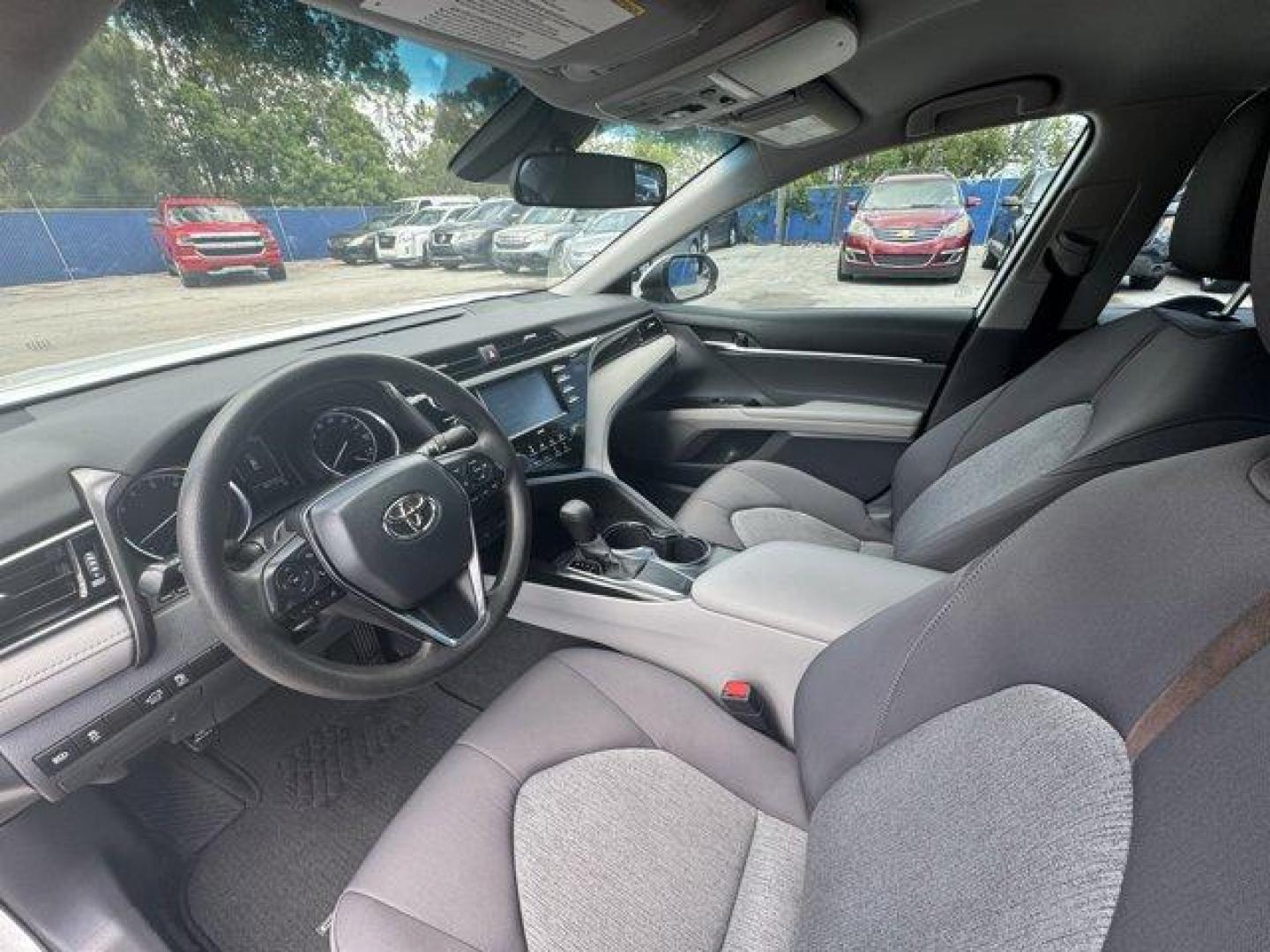 2020 White Toyota Camry (4T1C11AK3LU) with an 4 2.5 L engine, Automatic transmission, located at 27610 S Dixie Hwy, Homestead, FL, 33032, (305) 749-2348, 25.510241, -80.438301 - Boasts 39 Highway MPG and 28 City MPG! This Toyota Camry boasts a Regular Unleaded I-4 2.5 L/152 engine powering this Automatic transmission. Window Grid And Roof Mount Antenna, Variable Intermittent Wipers, Valet Function.* This Toyota Camry Features the Following Options *Urethane Gear Shifter Mat - Photo#10