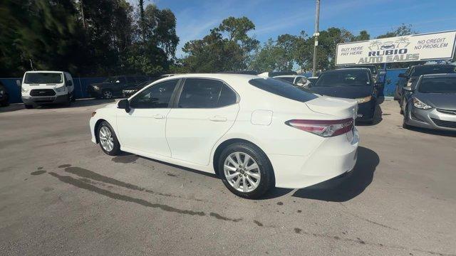 2020 White Toyota Camry (4T1C11AK3LU) with an 4 2.5 L engine, Automatic transmission, located at 27610 S Dixie Hwy, Homestead, FL, 33032, (305) 749-2348, 25.510241, -80.438301 - Boasts 39 Highway MPG and 28 City MPG! This Toyota Camry boasts a Regular Unleaded I-4 2.5 L/152 engine powering this Automatic transmission. Window Grid And Roof Mount Antenna, Variable Intermittent Wipers, Valet Function.* This Toyota Camry Features the Following Options *Urethane Gear Shifter Mat - Photo#2