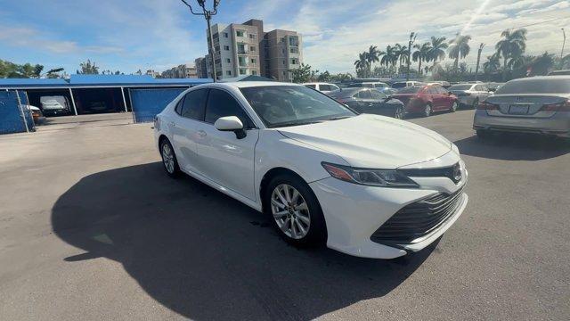 2020 White Toyota Camry (4T1C11AK3LU) with an 4 2.5 L engine, Automatic transmission, located at 27610 S Dixie Hwy, Homestead, FL, 33032, (305) 749-2348, 25.510241, -80.438301 - Boasts 39 Highway MPG and 28 City MPG! This Toyota Camry boasts a Regular Unleaded I-4 2.5 L/152 engine powering this Automatic transmission. Window Grid And Roof Mount Antenna, Variable Intermittent Wipers, Valet Function.* This Toyota Camry Features the Following Options *Urethane Gear Shifter Mat - Photo#6