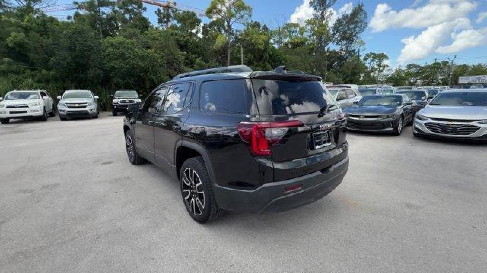 2021 Ebony Twilight Metallic /Jet Black GMC Acadia (1GKKNKLA3MZ) with an 4 2.5L engine, Automatic transmission, located at 27610 S Dixie Hwy, Homestead, FL, 33032, (305) 749-2348, 25.510241, -80.438301 - Boasts 27 Highway MPG and 21 City MPG! This GMC Acadia boasts a Gas I4 2.5L/150 engine powering this Automatic transmission. TRANSMISSION, 9-SPEED AUTOMATIC, ELECTRONICALLY-CONTROLLED with 2.5L engine (STD), SLE PREFERRED EQUIPMENT GROUP includes standard equipment, SEATS, FRONT BUCKET (STD).* This - Photo#2