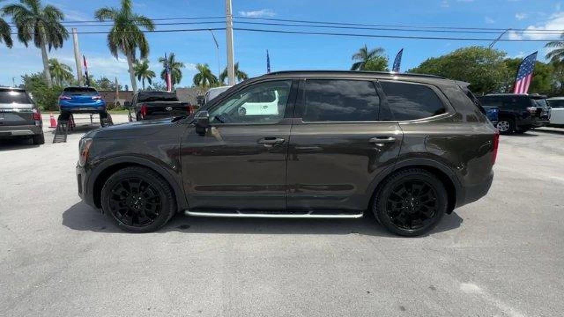 2022 Dark Moss /Black Kia Telluride (5XYP3DHC6NG) with an 6 3.8 L engine, Automatic transmission, located at 27610 S Dixie Hwy, Homestead, FL, 33032, (305) 749-2348, 25.510241, -80.438301 - Boasts 24 Highway MPG and 19 City MPG! This Kia Telluride delivers a Regular Unleaded V-6 3.8 L/231 engine powering this Automatic transmission. CARPETED FLOOR MATS, BLACK, LEATHER SEAT TRIM, Variable Intermittent Wipers.* This Kia Telluride Features the Following Options *Trunk/Hatch Auto-Latch, Tr - Photo#1