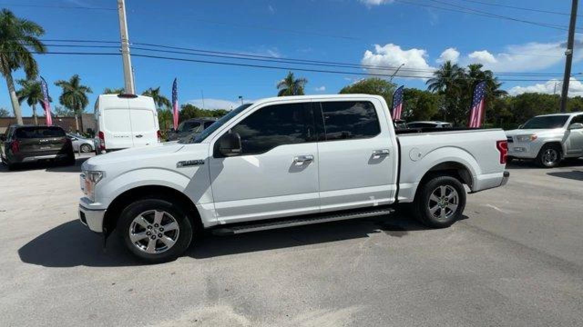 2019 White Ford F-150 (1FTEW1C53KF) with an 8 5.0 L engine, Automatic transmission, located at 27610 S Dixie Hwy, Homestead, FL, 33032, (305) 749-2348, 25.510241, -80.438301 - Delivers 25 Highway MPG and 19 City MPG! This Ford F-150 delivers a Regular Unleaded V8 5.0 L engine powering this Automatic transmission. Variable Intermittent Wipers, Urethane Gear Shifter Material, Transmission w/Driver Selectable Mode and SelectShift Sequential Shift Control.*This Ford F-150 Com - Photo#1